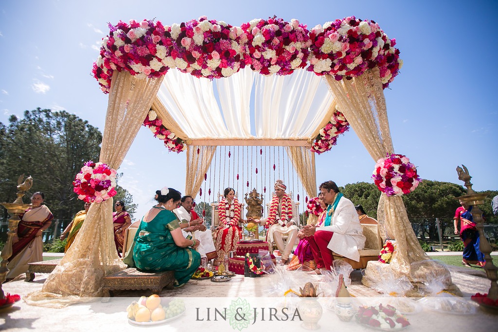 Pink and white floral wedding arch